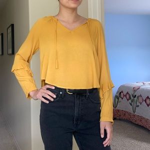 Mustard yellow long ruffle sleeve top.